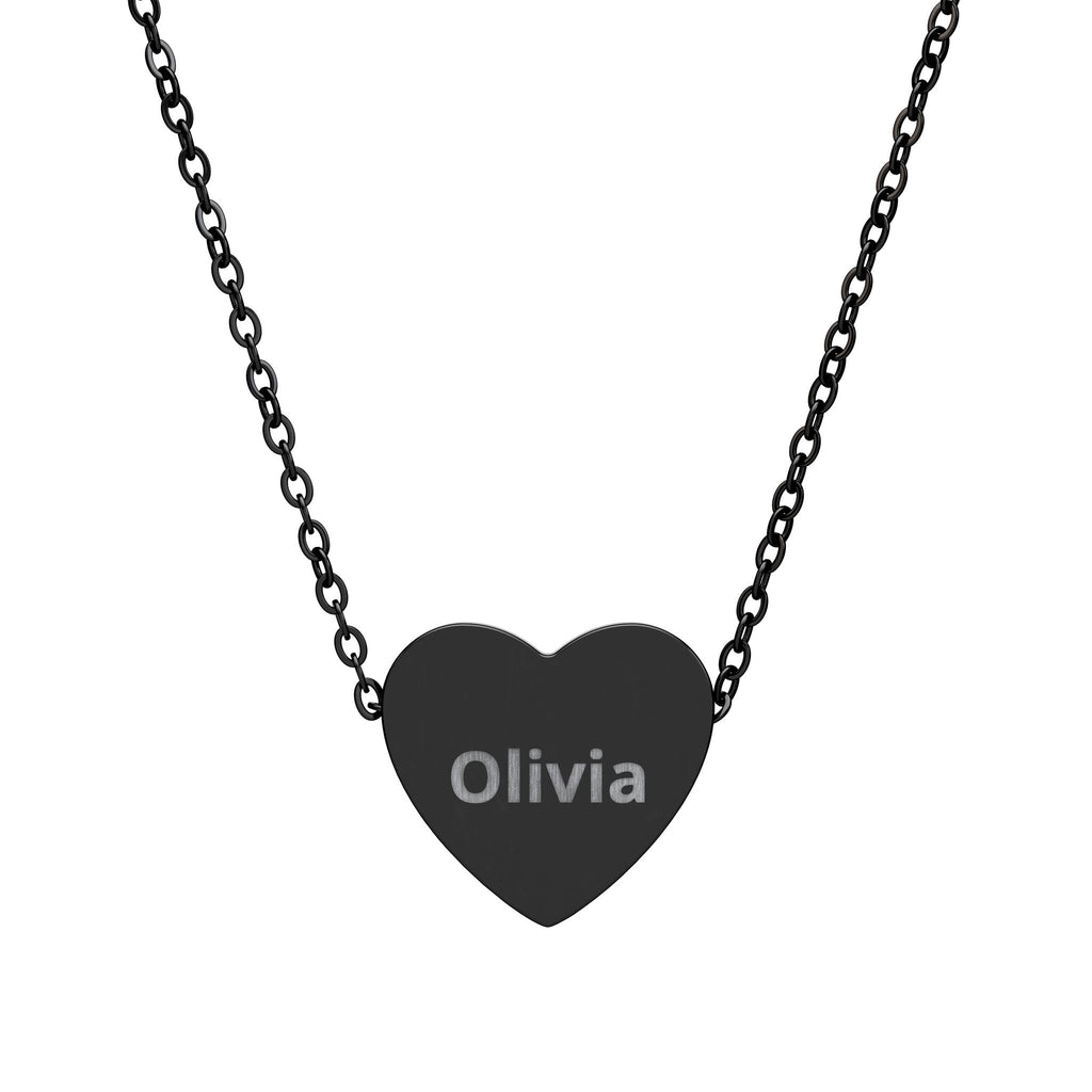 Black heart-shaped pendant necklace with engraved text on a white background